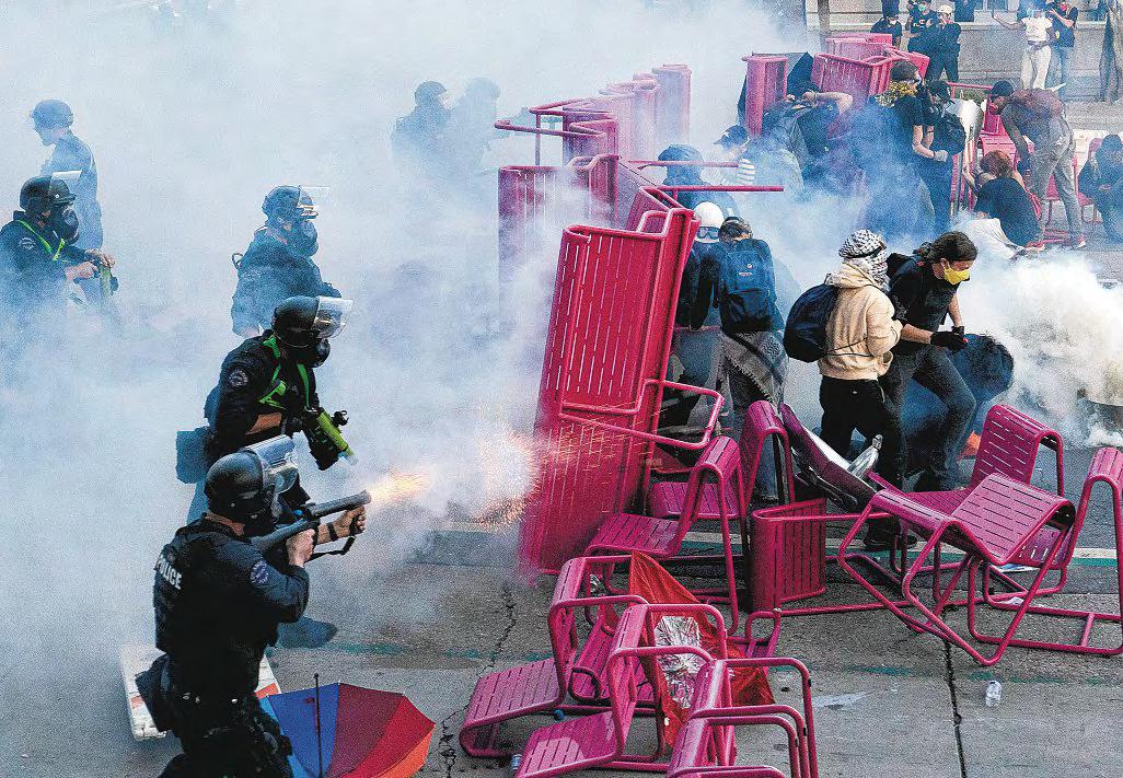 Los Angeles police order protesters to disperse as Trump deploys troops