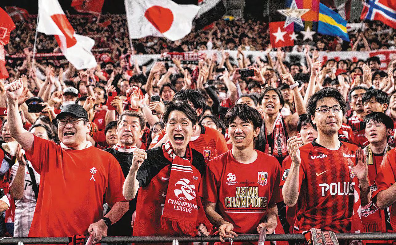 Fans of Japan's 'Red Devils' vow to pump up the volume