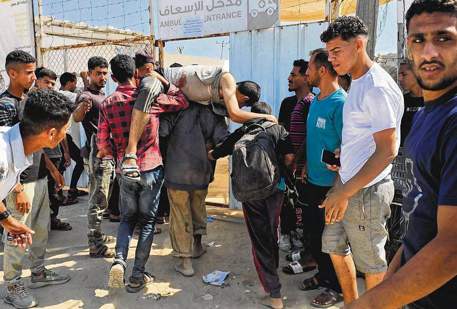 Israeli Fire Kills 40 in Gaza, Many Near Aid Distribution Site