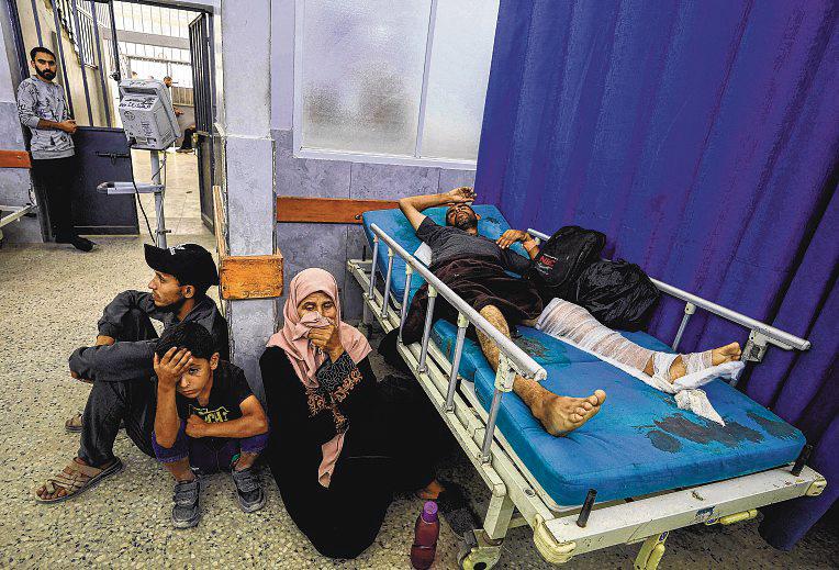 Israeli Strikes Kill 30 in Gaza, Say Medics, as Attention Shifts to Iran