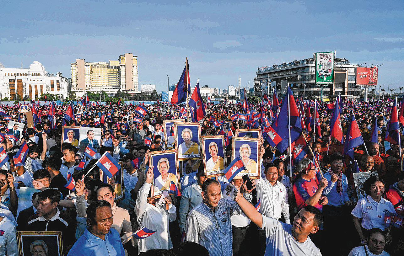 Cambodians join govt rally as leaked call angers Thai PM