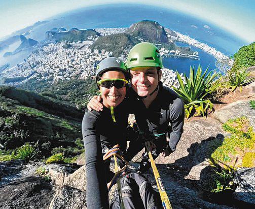 Sightseeing combined with rock climbing keeps adventurous couple tightly bonded