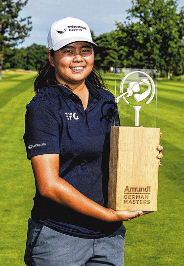 Golfer Tan might be shy, but she loves a scrap