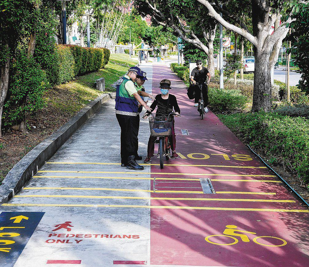 Pedestrian-only path rules to be enforced reasonably, says Baey Yam Keng