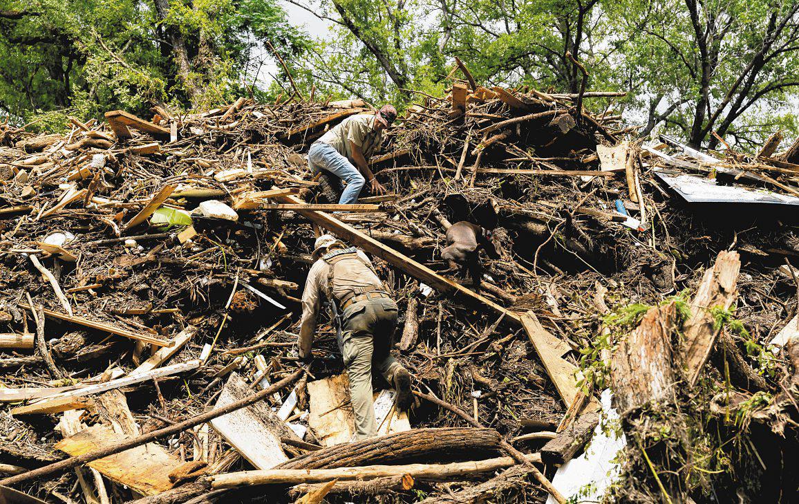 Death toll in Texas flash floods rises as search teams face thunderstorms