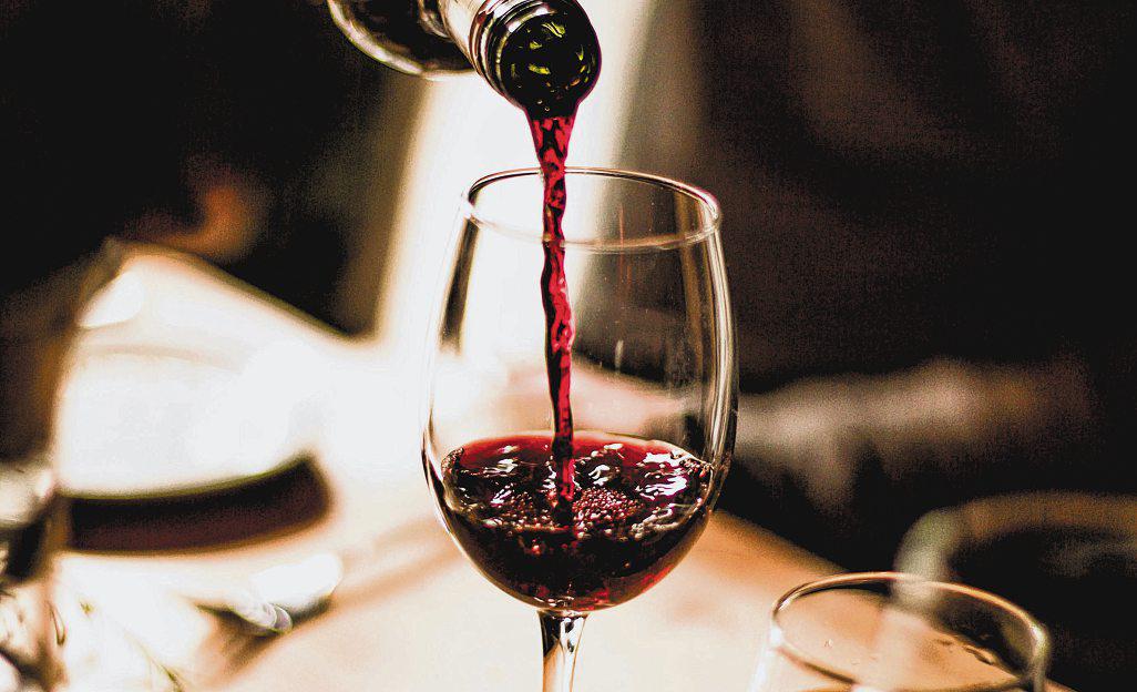 Is wine different from other alcoholic drinks when it comes to cancer risk?