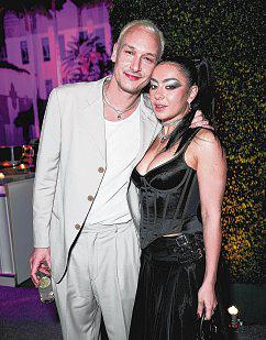 Singer Charli XCX weds The 1975 drummer George Daniel