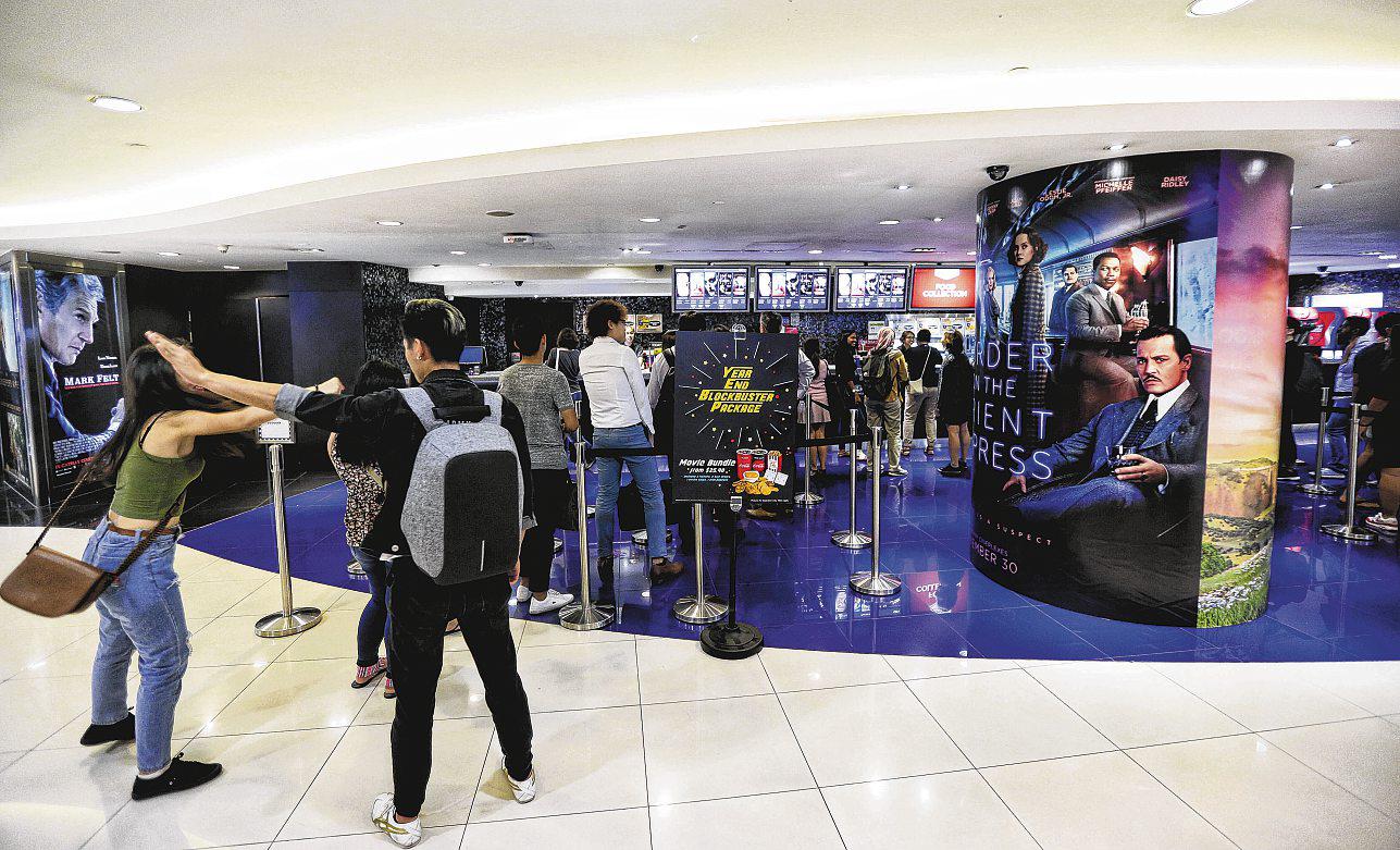 Cinemas struggle in a world that cannot sit still