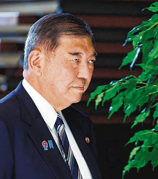 Japan's PM Ishiba stresses his resolve to stay on and avoid political vacuum