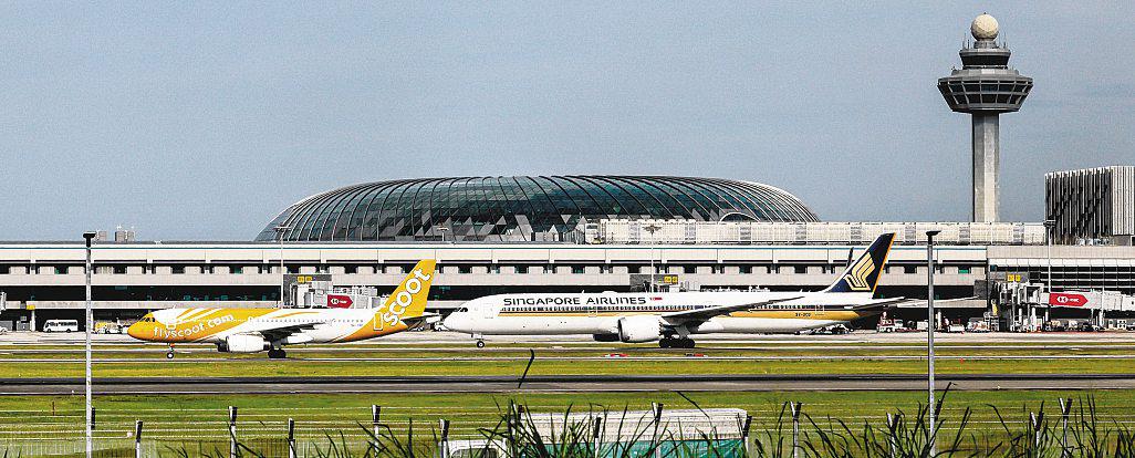 SIA's QI profit falls 59%; airline group sees volatile times ahead