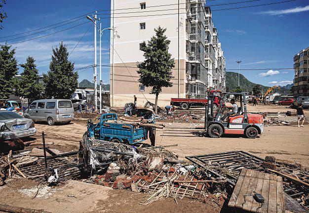 Beijing Officials Admit Gaps in Readiness After Heavy Rain Kills 44