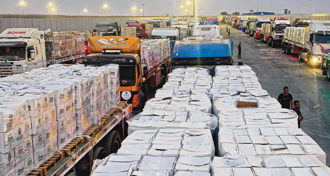 Gaza aid shipments stuck on roadsides and in warehouses