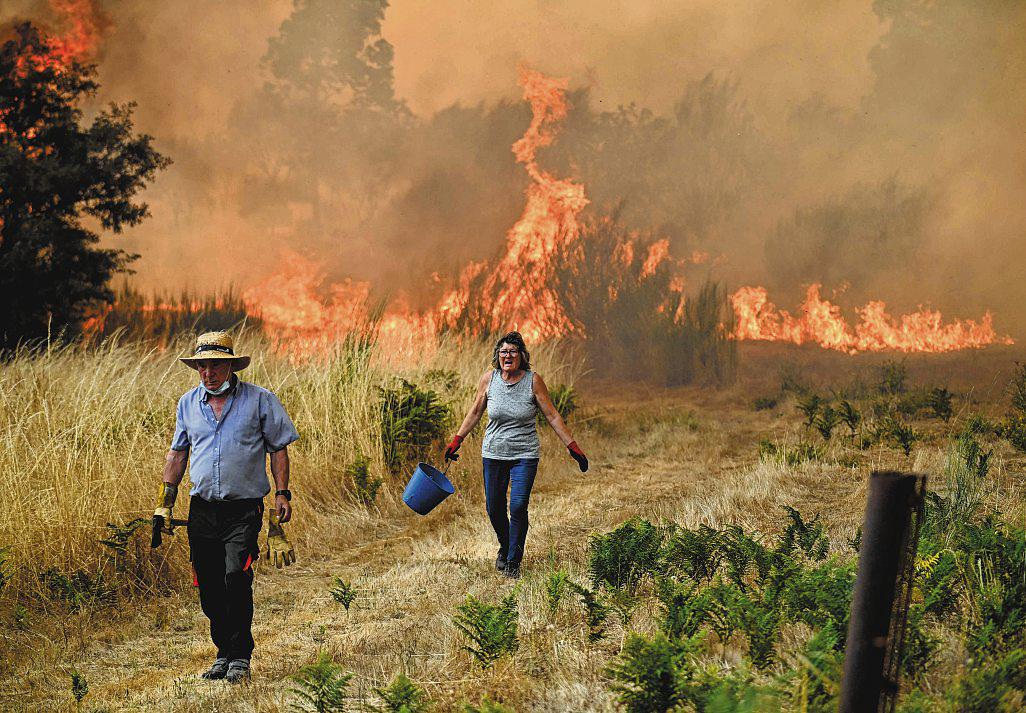 Spain battles 14 major fires, with unfavourable conditions set to fuel more