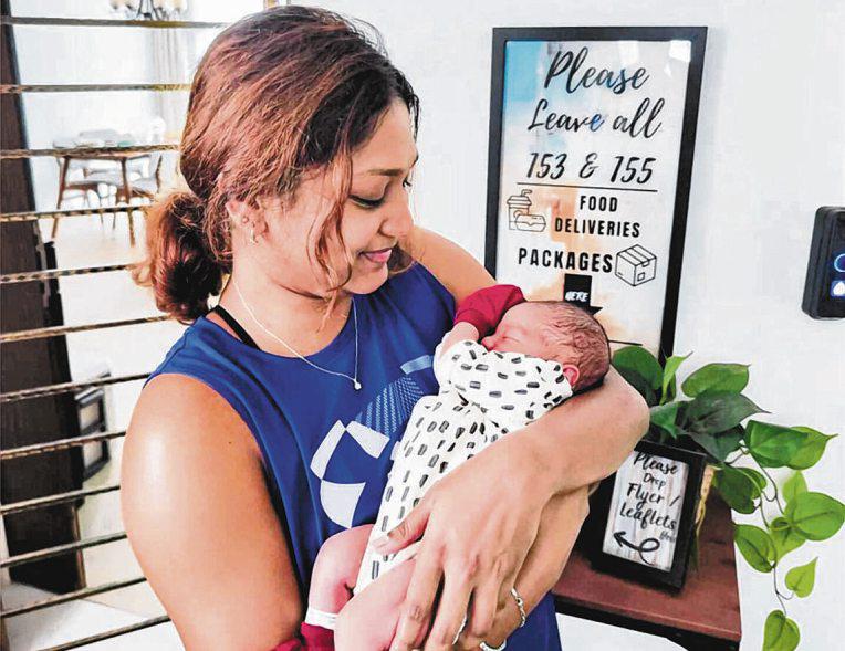 Woman and her friend help neighbour give birth at home