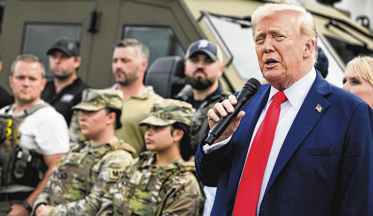 US President visits police and troops deployed in Washington