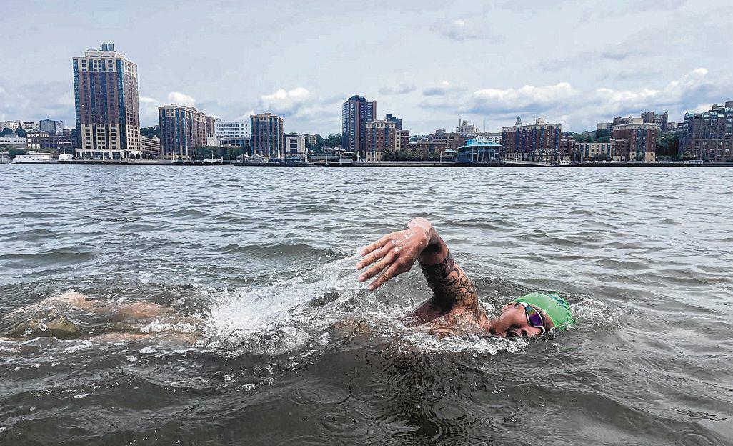 Navy doc to swim over 100km in three iconic waterways to raise $1.5m for community hospital