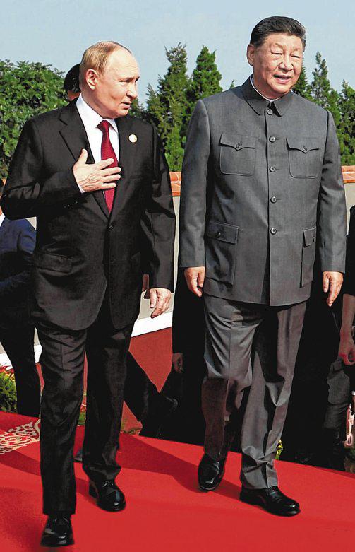 A meeting of equals? Putin feted in China but Xi key to Russia's economy