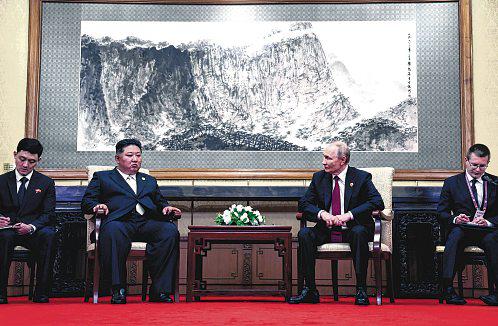 N. Korean staff wipe off traces of Kim after his meeting with Putin