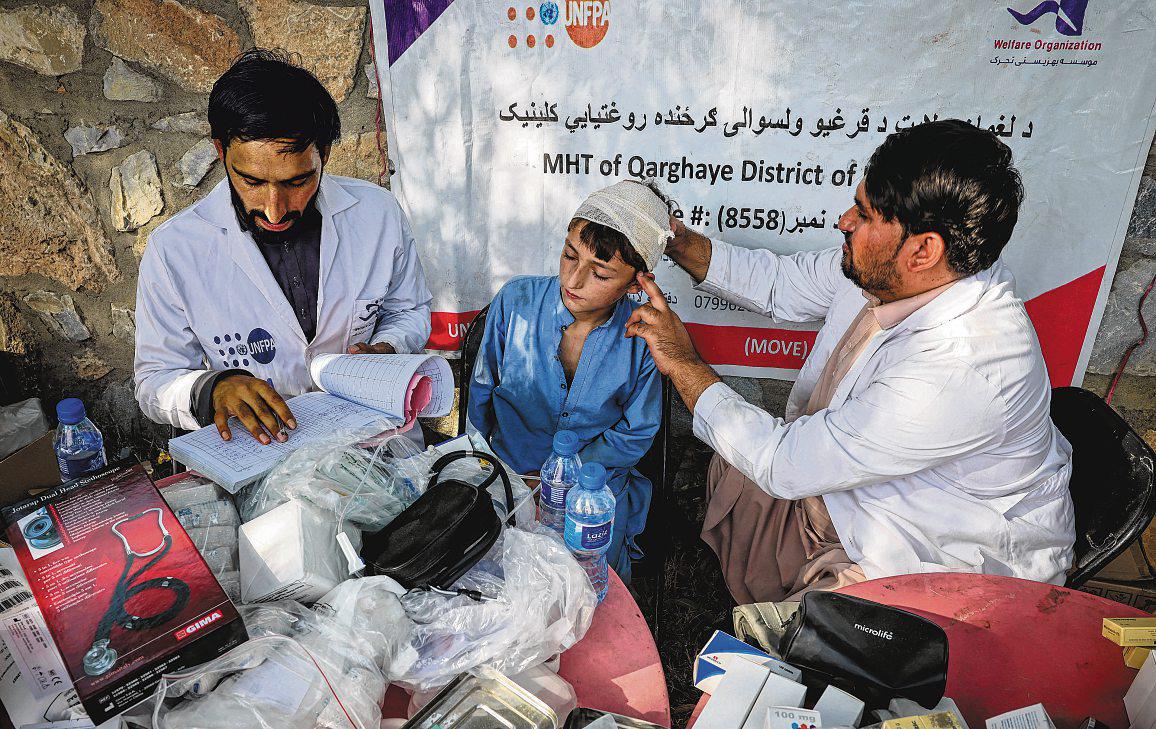 WHO asks Taliban to lift curbs on female aid workers for quake relief
