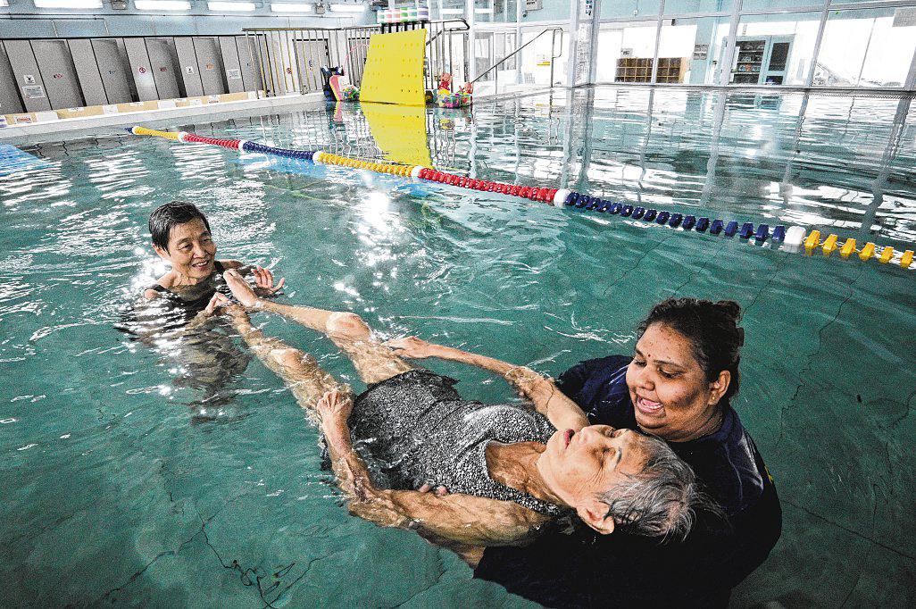 94-year-old wheelchair user among those buoyed by Enabling Village's inclusive pool