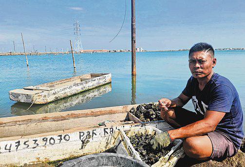 Indonesia's seawall project set to expand, drawing mixed reactions