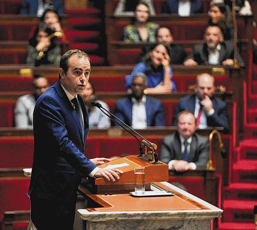 French PM survives no-trust votes after giving in on pension reform