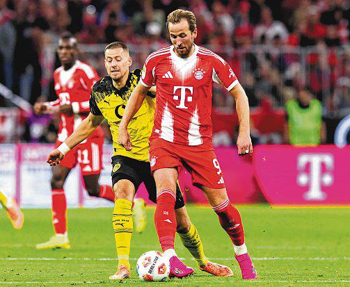 Kane keen to stay on as goal helps Bayern remain perfect