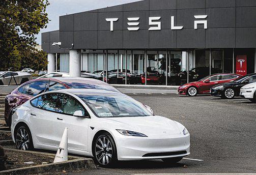Tesla's profit tumbles despite record sales, amid higher costs and fading tax credits