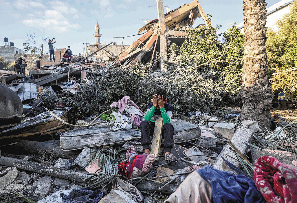 Israel says it will uphold Gaza ceasefire, a day after strikes kill 104