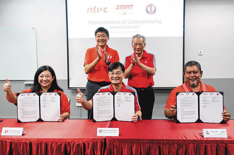 New agreement inked to upskill SMRT contractors' workers