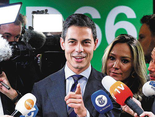 Dutch centrist claims victory in polls, saying populists can be beaten