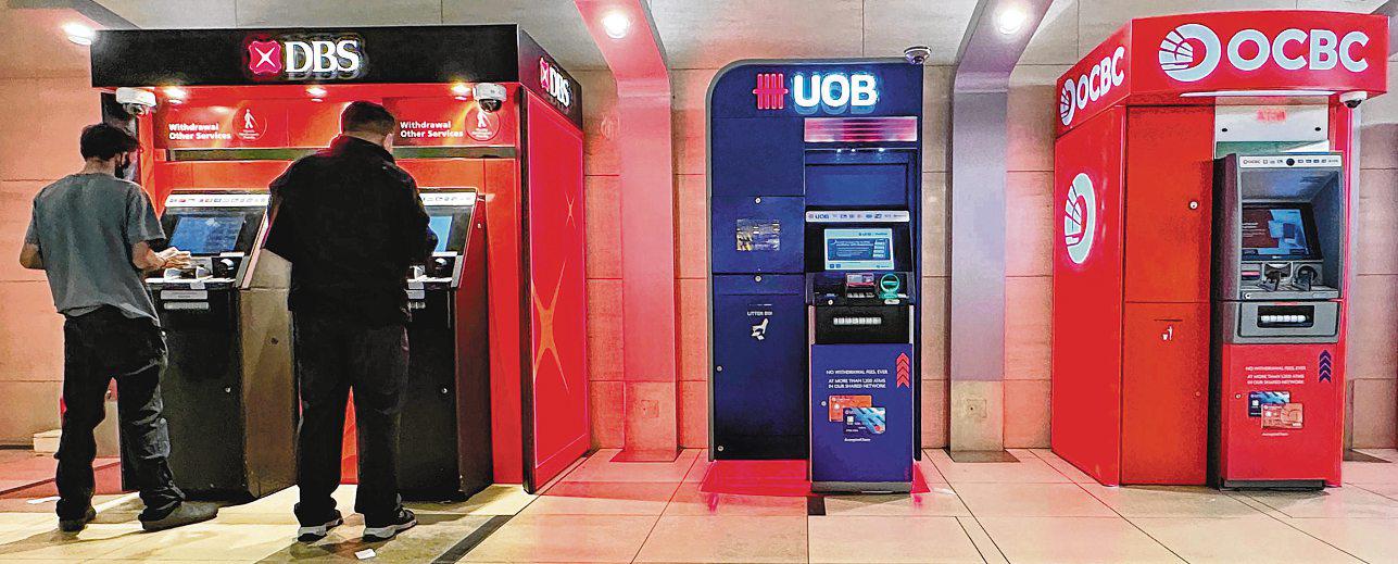 DBS, OCBC shares hit new highs as Q3 earnings beat forecasts; UOB falls