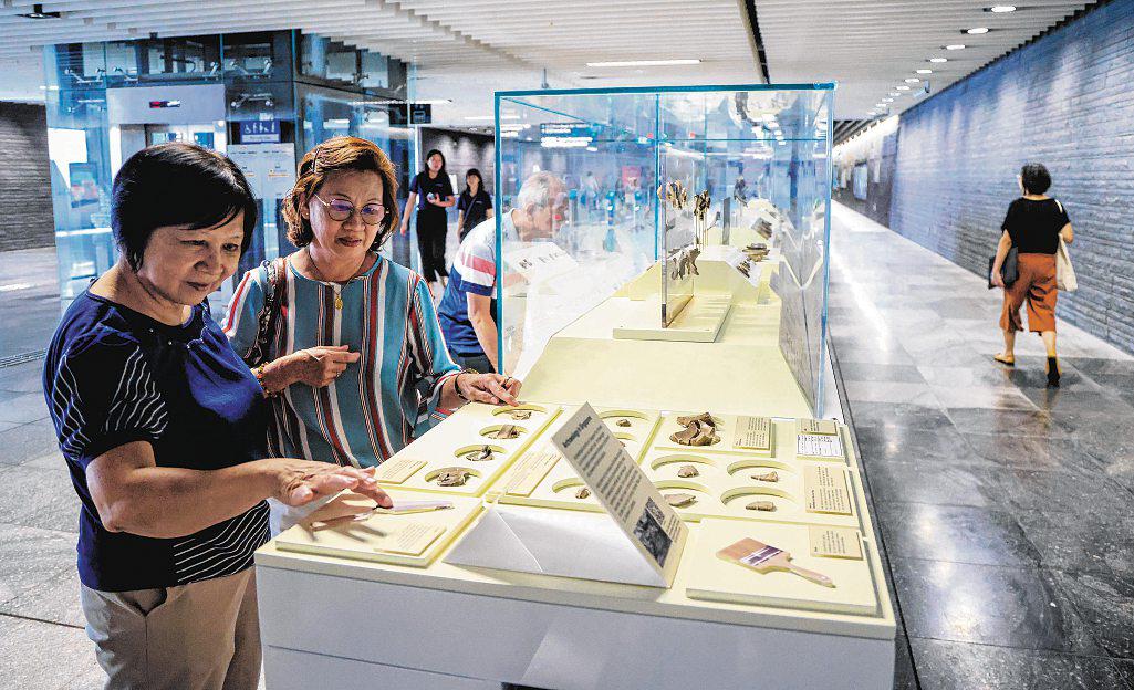 Artefacts from one of S’pore’s largest archaeological sites on display at Bras Basah MRT station