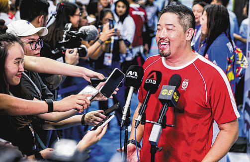 Tan happy with 19-gold haul as S'pore 'transition'