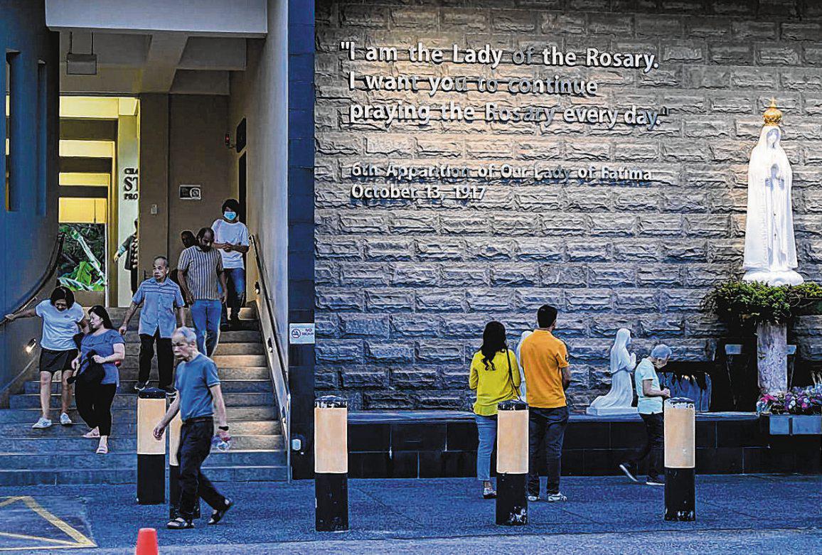 Churchgoers unfazed as mass resumes a day after suspicious item found at church