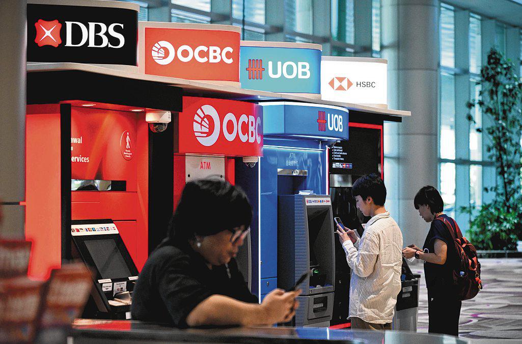 DBS shares cross $58 for Ist time as bank stocks extend multi-week rally