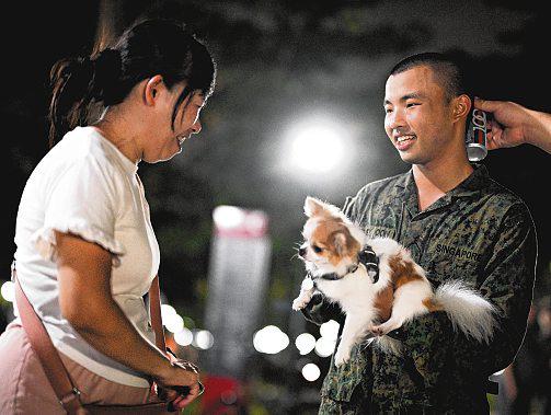 DIGGING IN... MARCHING ON... ONWARD TOGETHER | The Straits Times -  newspaper - Read this story on Magzter.com