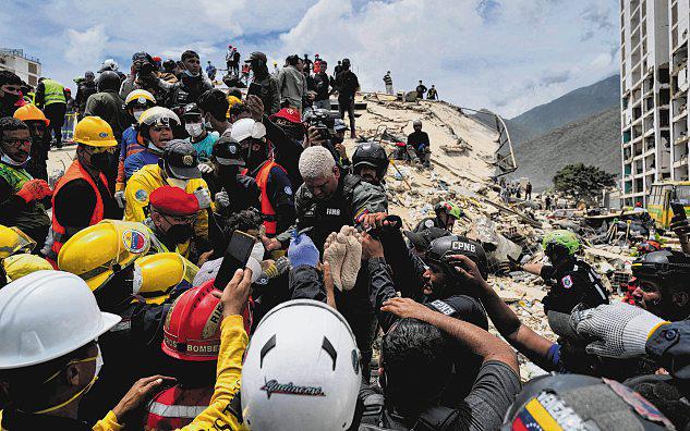 Venezuela quake death toll nears 1,500 as rescue work continues