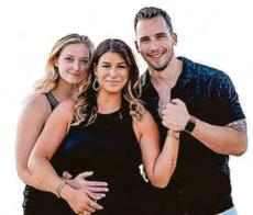 This happy throuple say I do, I do, I do
