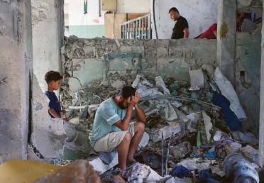 Miracle girl is rescued from burning school as mum and siblings killed