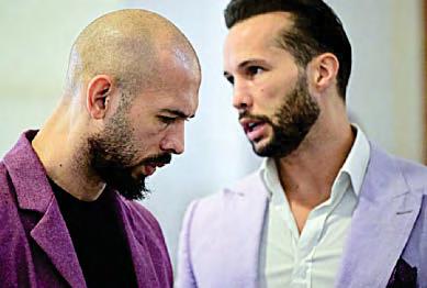 Tate duo face rape and 'sex trafficking' raps in Britain