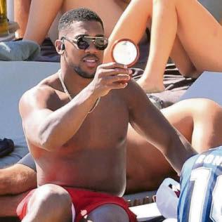 AJ stays humble in beach shades