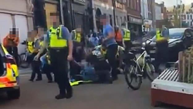 Rookie cop stabbed in city street attack