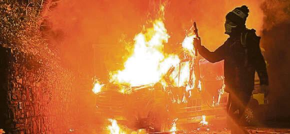 5 charged after violence flares at hotel protest