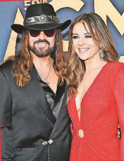 Liz & Billy paint town red