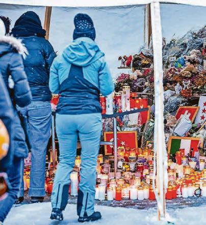 Switzerland falls silent to remember the 40 dead