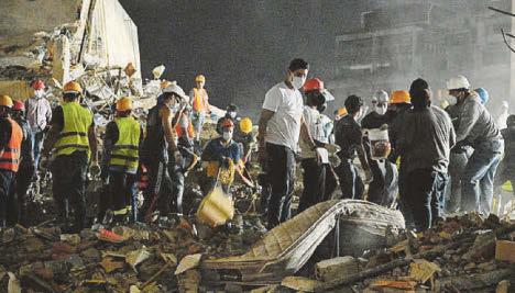 I clung to doorframe as floors collapsed