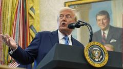 Donald Trump signals China tariffs will come down, says he won't fire Fed chief