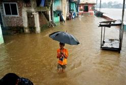 What is causing widespread rainfall across India?