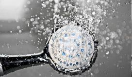What happens to our skin when we take hot shower?